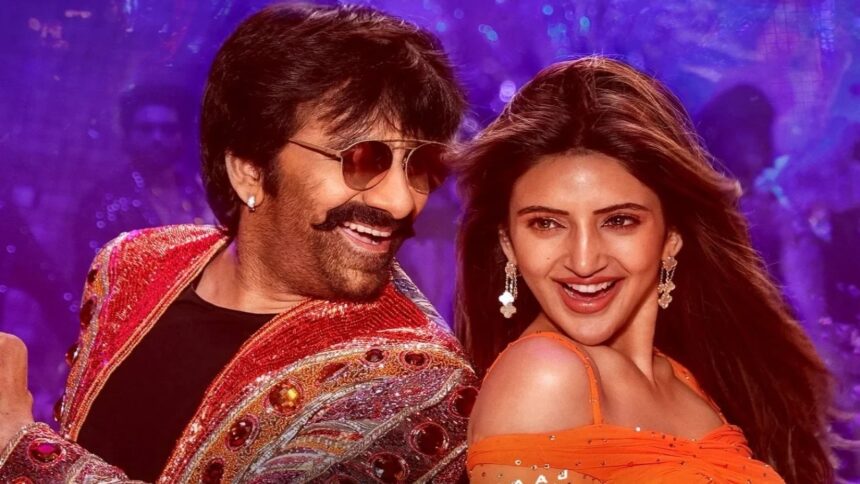 Mass Jathara फिल्म का पोस्टर जिसमें रवी तेजा ऐक्शन मोड में दिख रहे हैं और स्रीलीला उनके पास खड़ी हैं। बैकग्राउंड में तेज रोशनी, मसाला-स्टाइल एक्शन लुक और फिल्म का टाइटल दिखाई देता है।