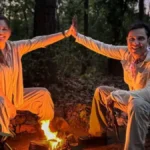 रणदीप हुड्डा और लिन लैशराम मुस्कुरा रहे हैं, खुशखबरी साझा करते हुए।