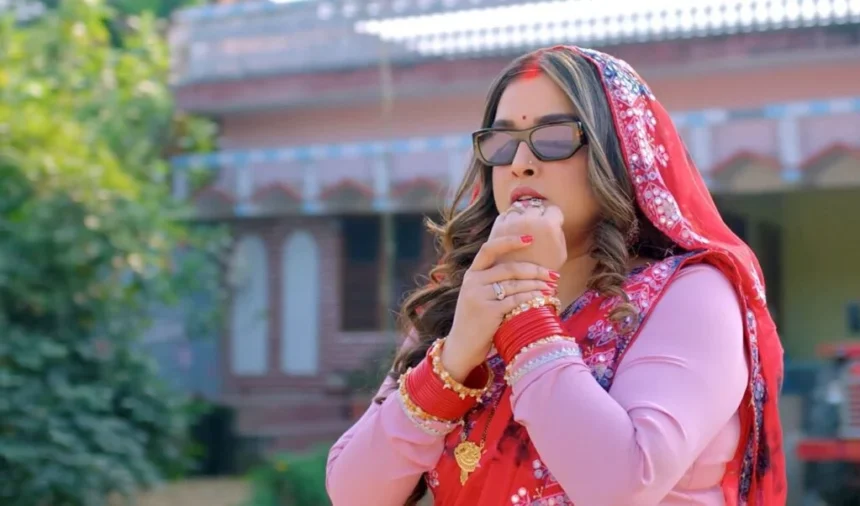 Amrapali Dubey in a saree as a detective daughter-in-law in CID Bahu trailer scene from Bhojpuri film.