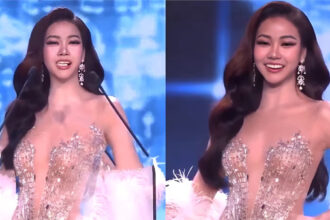 मिस ग्रैंड थाईलैंड 2026 के मंच पर रैंप वॉक करती मॉडल कमोलवन चानागो, बोलते समय नकली दांत ढीले होने के बावजूद आत्मविश्वास के साथ खुद को संभालती हुईं।