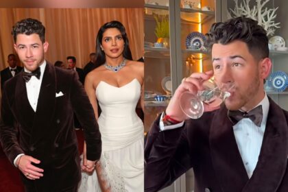 Priyanka Chopra ऑस्कर 2026 के रेड कार्पेट पर व्हाइट गाउन में ग्लैमरस अंदाज में पोज देती हुईं, साथ में Nick Jonas ब्लैक टक्सीडो में नजर आ रहे हैं और उनके हाथ में बंधा कलावा भी दिख रहा है।
