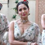 Malaika Arora wearing a pastel pink designer saree at the wedding reception of Kritika Kamra and Gaurav Kapoor in Mumbai, showcasing an elegant traditional look.