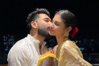 Mouni Roy और Suraj Nambiar की साथ में मुस्कुराते हुए तस्वीर, शादी के चार साल बाद अलग होने की खबर चर्चा में।