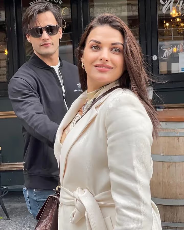 Himanshi Khurana and Asim Riaz posing together during a past media event, highlighting their controversial relationship news.