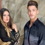 Asim Riaz and Himanshi Khurana posing together at an event, highlighting their past relationship amid recent news statements about religious differences.