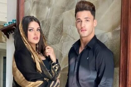 Asim Riaz and Himanshi Khurana posing together at an event, highlighting their past relationship amid recent news statements about religious differences.