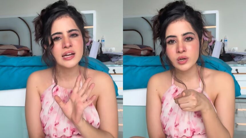 Uorfi Javed posing in a bold outfit, looking thoughtful while speaking about her professional rejections in 2026.